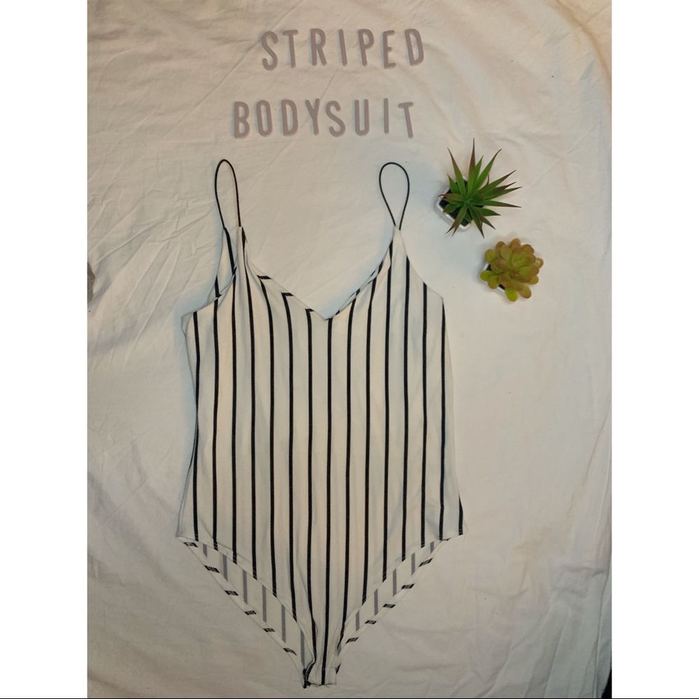 Soft white and black striped bodysuit